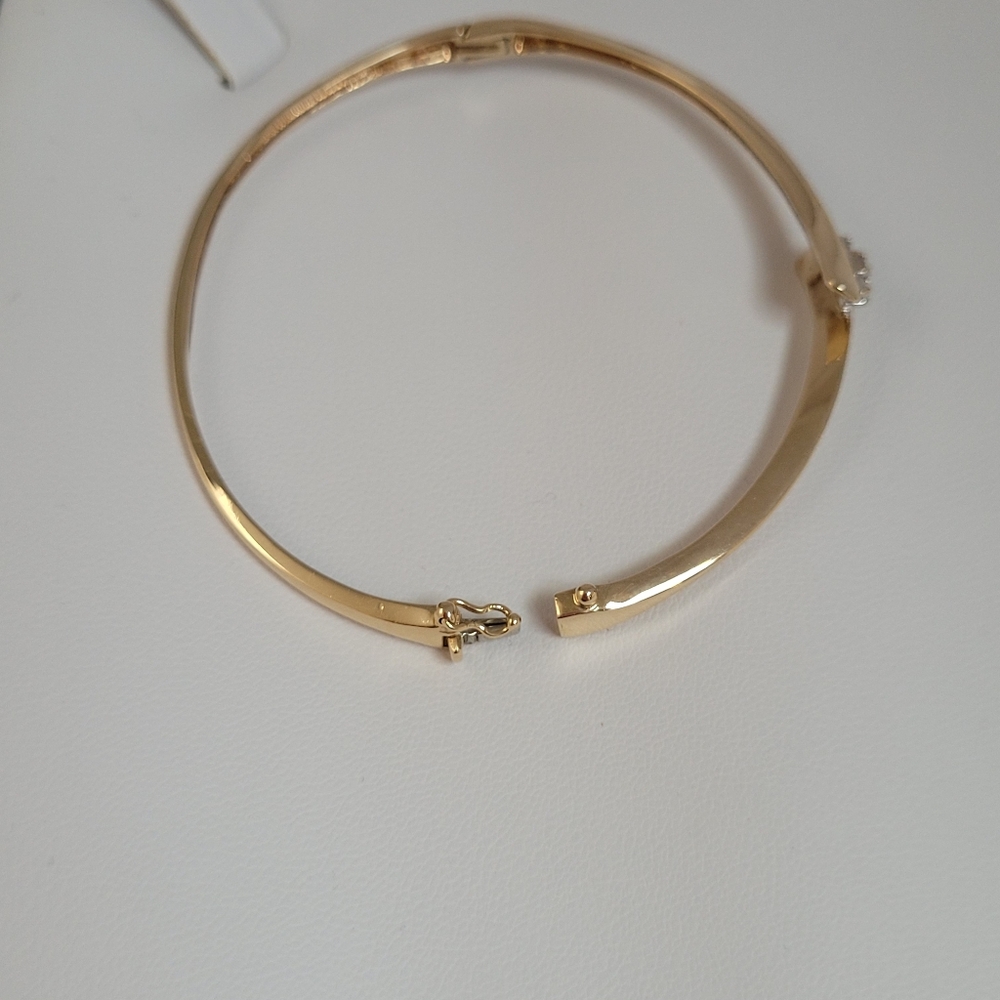 10k Yellow Gold Crossover Natural Diamond Bangle Bracelet. - Picture 3 of 6